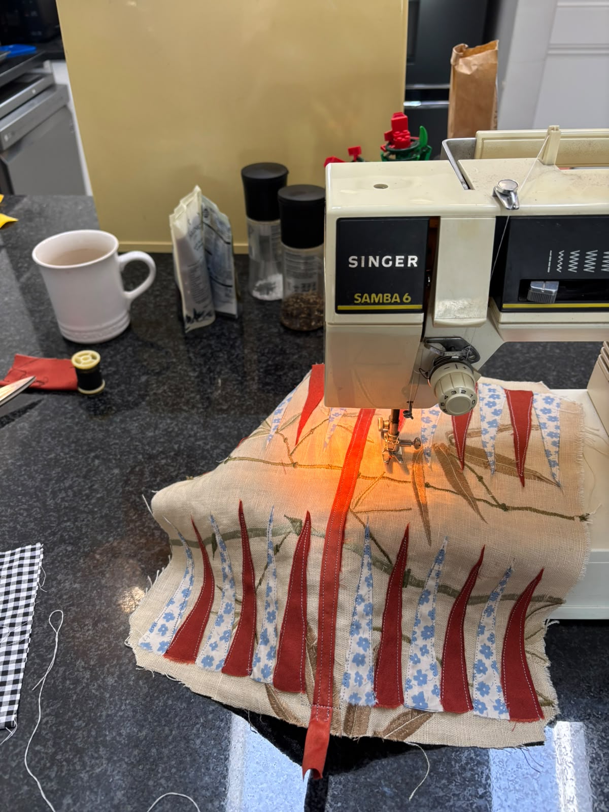 Stitching a YourTurn board on a Singer sewing machine.